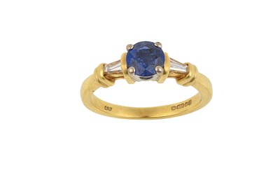 Lot 2309 - A Sapphire and Diamond Ring the round cut...