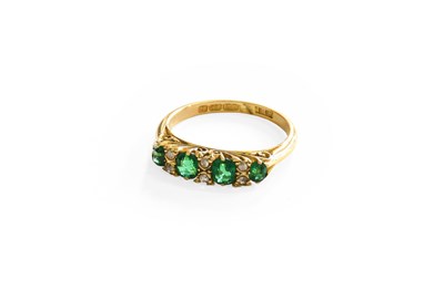Lot 244 - An 18 Carat Gold Green Glass and Diamond Ring,...