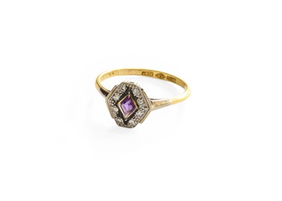 Lot 253 - An Amethyst and Diamond Cluster Ring, of...