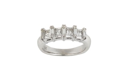 Lot 2400 - A Diamond Half Hoop Ring baguette cut diamonds...