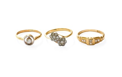 Lot 288 - An 18 Carat Gold Diamond Six Stone Ring,...