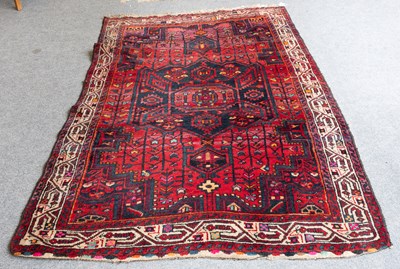 Lot 1002 - "Bukhara Rug", the mid-indigo field of stepped...