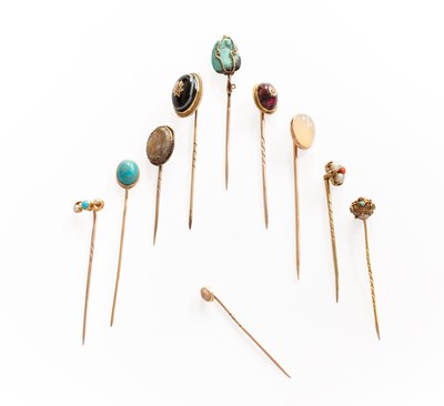 Lot 252 - Ten Stick Pins, of varying designs, including...