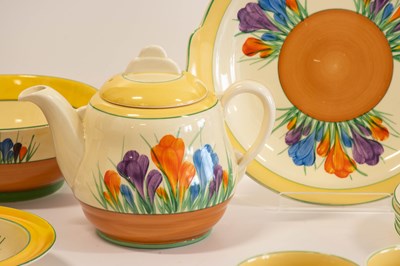 Lot 569 - A Clarice Cliff Crocus Bizarre Globe Tea Set,...