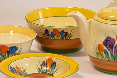 Lot 569 - A Clarice Cliff Crocus Bizarre Globe Tea Set,...