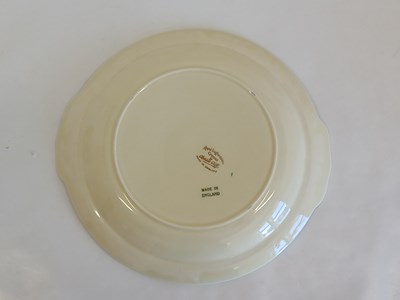 Lot 569 - A Clarice Cliff Crocus Bizarre Globe Tea Set,...