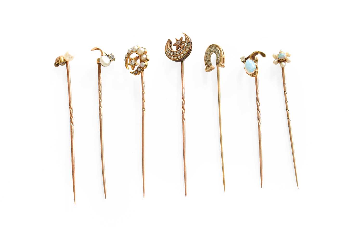 Lot 257 - Seven Stick Pins, of varying design,