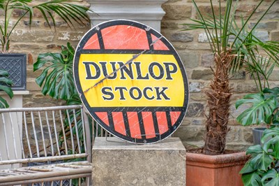 Lot 673 - DUNLOP STOCK: A Double-Sided Circular Enamel...