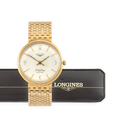 Lot 2253 - Longines: A 9 Carat Gold Automatic Centre...