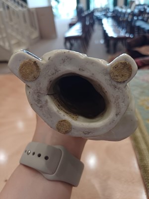 Lot 29 - A Chinese Porcelain Figure of an Immortal,...