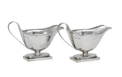 Lot 2193 - A Pair of George V Silver Sauceboats