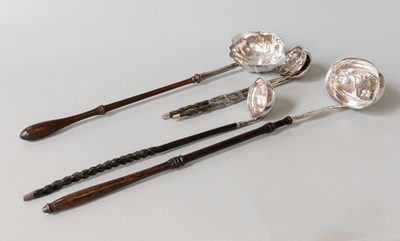 Lot 104 - Two George III Silver and Turned Wood Toddy...