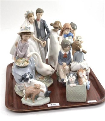 Lot 175 - A Lladro group of girl and swan; and seven Nao groups and figures