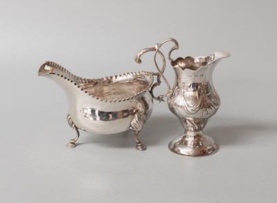 Lot 40 - A George III Silver Sauceboat and a George III...