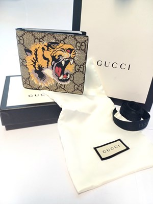 Lot 1034 - Gucci Bi-Fold Logo Wallet Printed with Tigers...