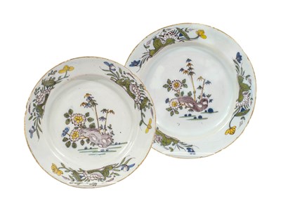 Lot 305 - A Pair of English Delft Plates, 18th century,...