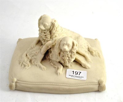 Lot 197 - Parian group of two seated King Charles spaniels on a cushion