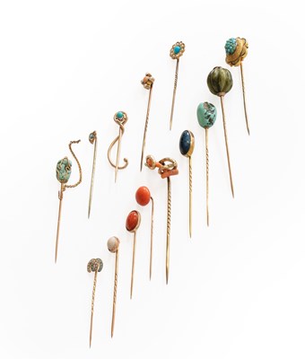 Lot 241 - Fourteen Stick Pins, of varying design,...
