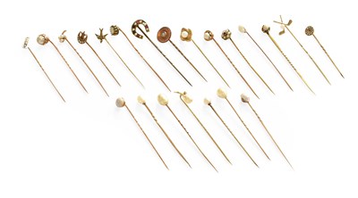 Lot 239 - Twenty-Two Stick Pins, of varying design,...