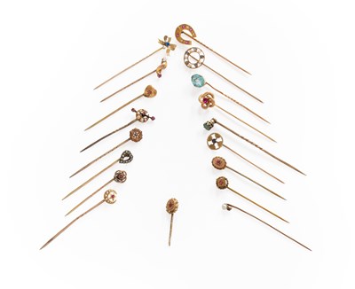 Lot 245 - Seventeen Stick Pins, of varying design,...