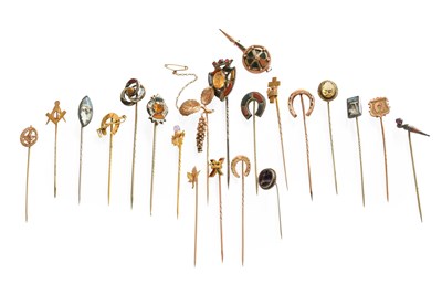 Lot 261 - Twenty-One Stick Pins, of varying design,...