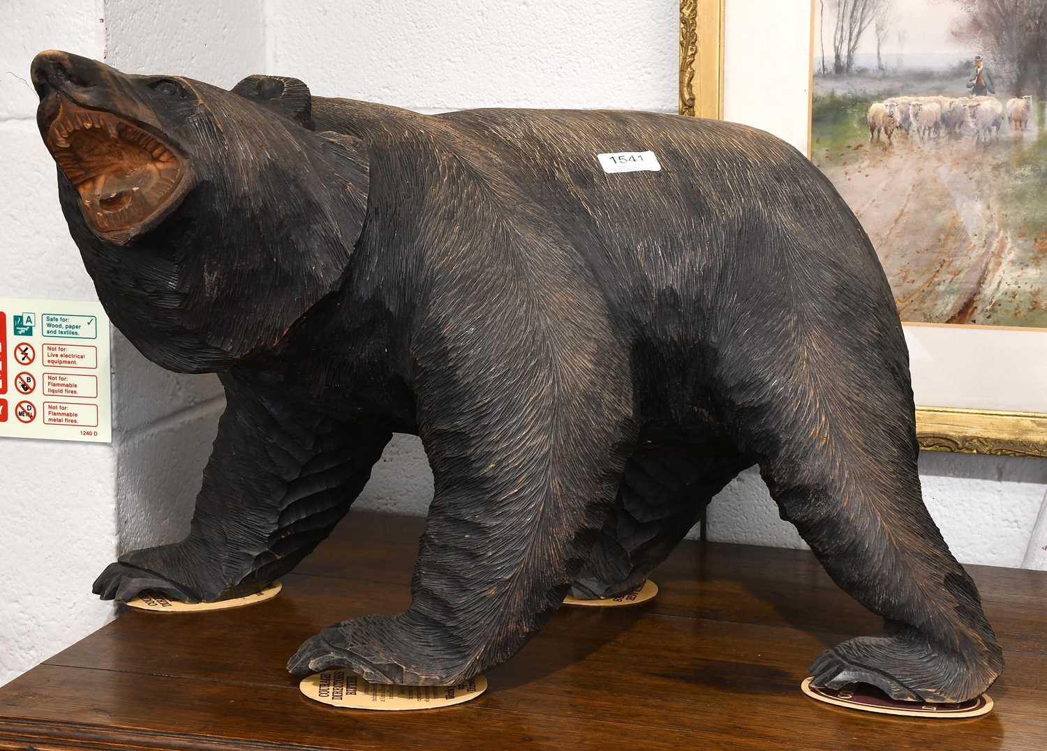 Lot 1541 - A Reproduction Carved Wooden Bear, with...