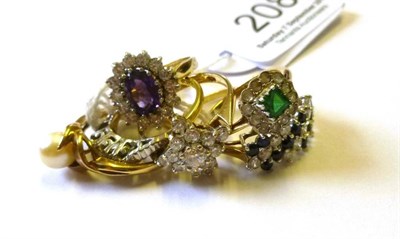 Lot 208 - A 9ct gold cubic zirconia cruciform ring; a 9ct gold amethyst and cubic zirconia cluster ring;...