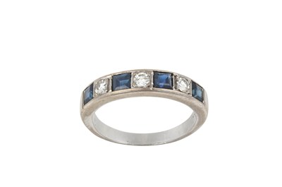 Lot 2373 - A Sapphire and Diamond Half Hoop Ring four...