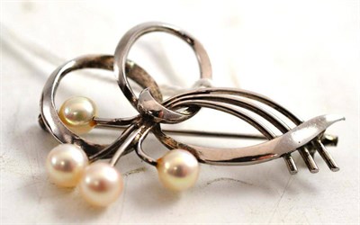 Lot 233 - A Mikimoto pearl set brooch