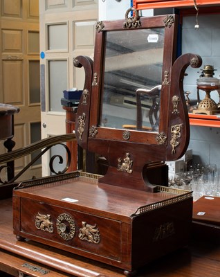 Lot 1282 - A French Empire Dressing Table Mirror, with...