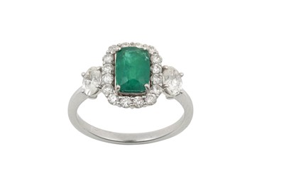 Lot 2218 - An Emerald and Diamond Cluster Ring the...
