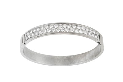 Lot 2252 - A Diamond Bangle the central section set...