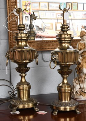 Lot 1279 - A Pair of Gilt Metal Table Lamps, with lion...