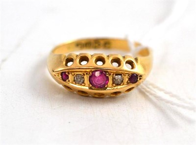 Lot 243 - An 18ct gold ruby and diamond ring