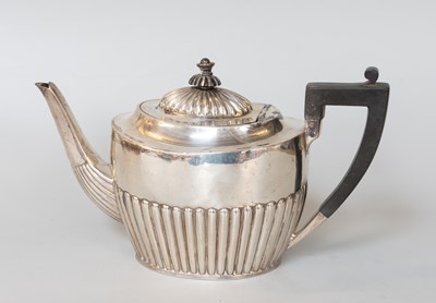 Lot 55 - A Victorian Silver Teapot, by Henry Atkin,...