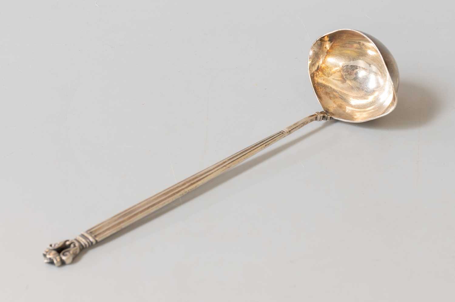Lot 111 - A Danish Silver Sauce-Ladle, by Georg Jensen,...