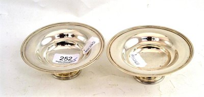 Lot 252 - Two silver footed small dishes