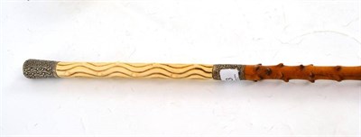 Lot 253 - Silver mounted ivory handled walking stick