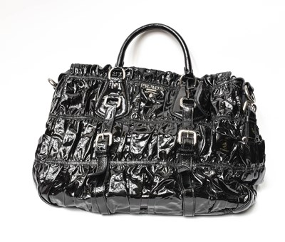 Lot 1061 - Prada Gaufre Black Patent Handbag, chrome-tone...