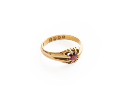 Lot 309 - An 18 Carat Gold Garnet Ring, the round cut...