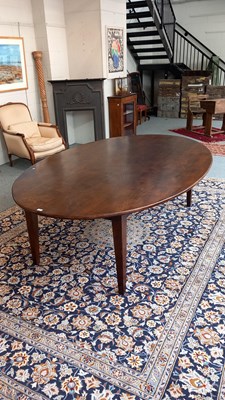 Lot 1405 - A Large Provincial Oak Dining Table, the oval...