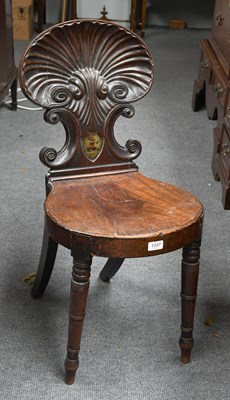 Lot 1337 - A Regency Mahogany Hall Chair, with carved...