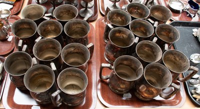 Lot 155 - A Set of Twenty George V Silver Plate Mugs, in...