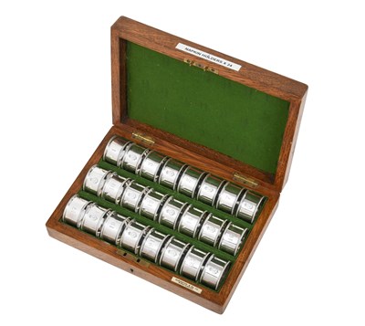 Lot 2163 - A Cased Set of Twenty-Four George V Silver Plate Napkin-Rings