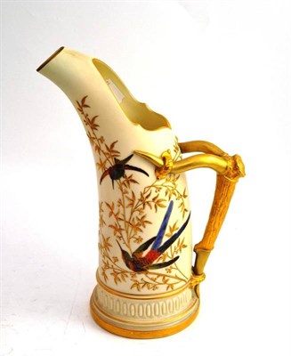 Lot 287 - A large Royal Worcester blush ivory ewer with ";antler"; handle