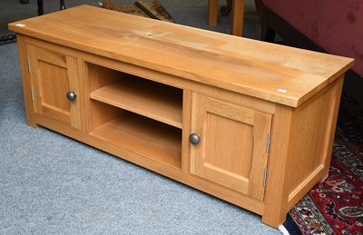 Lot 1214 - A Solid Oak Low Cabinet, 126cm by 43cm by 46cm