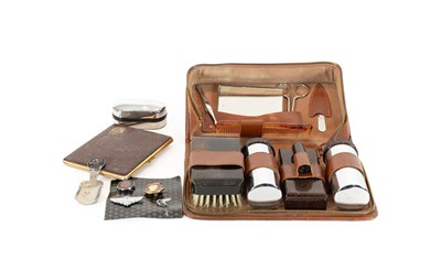 Lot 614 - A Brown Leather-Cased Travel Set and Contents,...