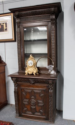 Lot 1238 - A Victorian Carved Oak Bookcase Cabinet with...