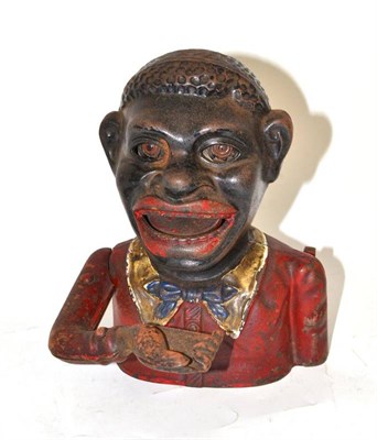 Lot 310 - A cast iron 'Jolly Nigger' money bank