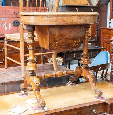 Lot 1368 - A Victorian Inlaid Walnut Work Table, the oval...